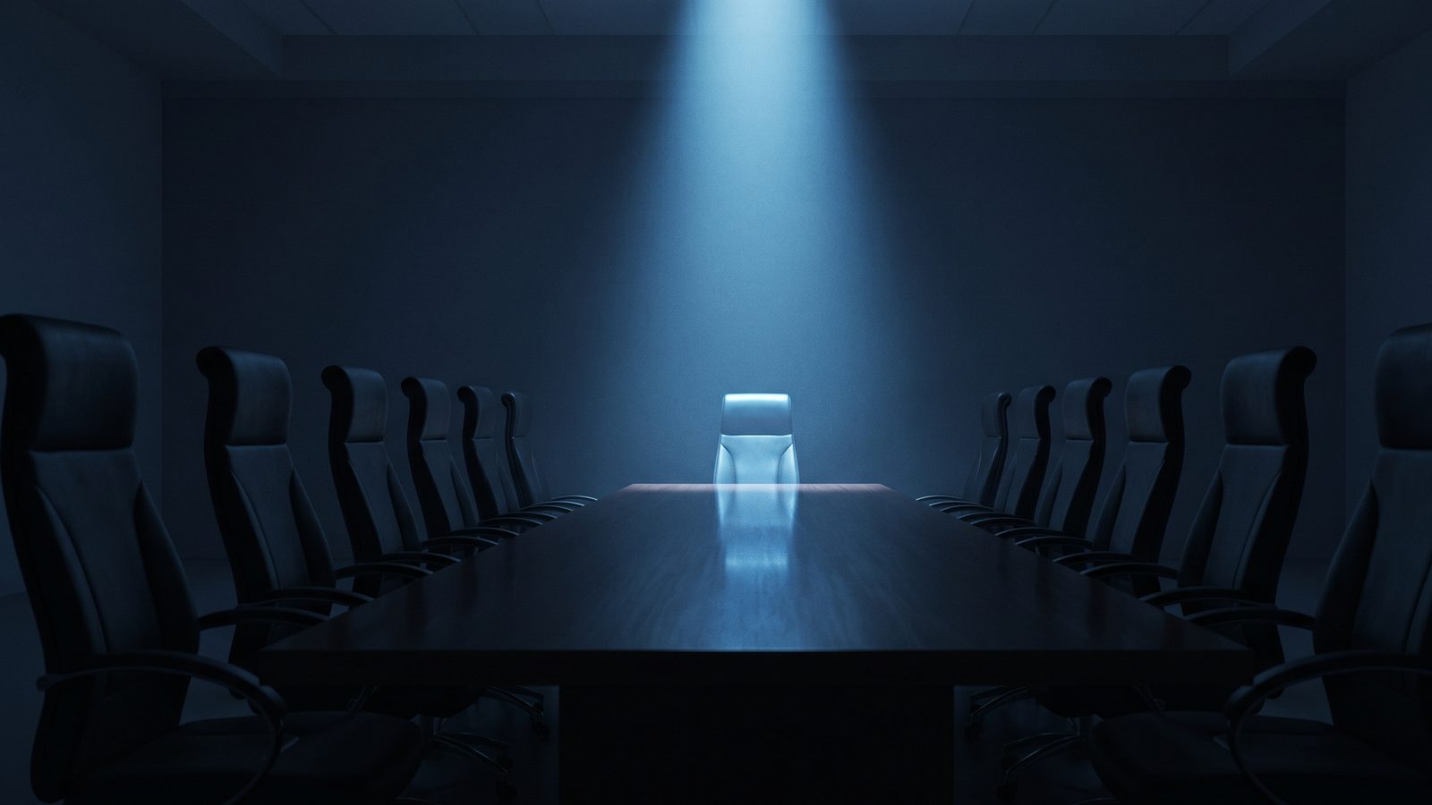 A dark boardroom, a long table of empty chairs facing one seat under a shaft of light.